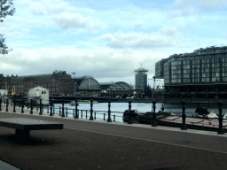 The Odebrug bridge over the Oosterdok canal, the Amsterdam Central Railway Station and the A`DAM Tower, viewed from the car at the Prins Hendrikkade street