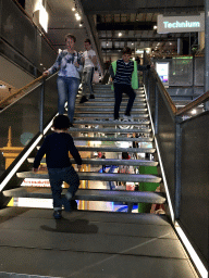 Max on the staircase from the First Floor to the Second Floor of the NEMO Science Museum