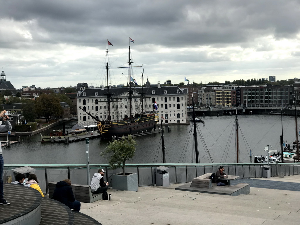 The Oosterdok canal and the National Maritime Museum with the replica of the `Amsterdam` ship, viewed from the roof at the Fifth Floor of the NEMO Science Museum