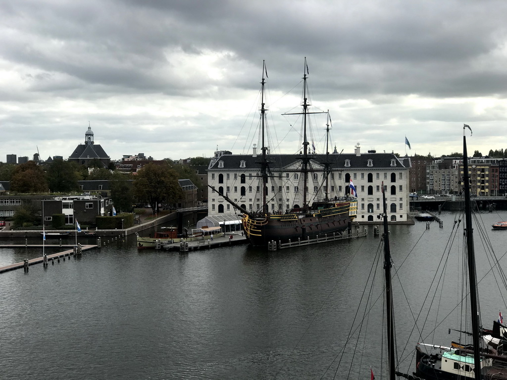 The Oosterdok canal and the National Maritime Museum with the replica of the `Amsterdam` ship, viewed from the roof at the Fifth Floor of the NEMO Science Museum