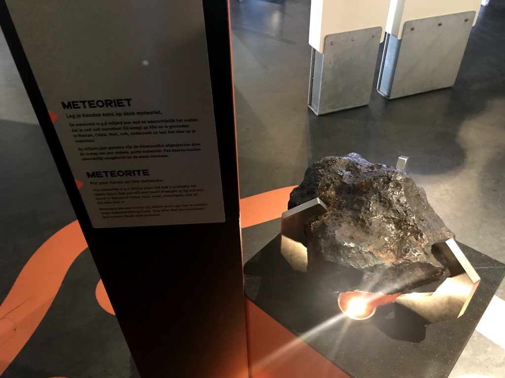 Meteorite at the Elementa exhibition at the Third Floor of the NEMO Science Museum, with explanation