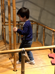 Max with a cardboard game at the Fenomena exhibition at the First Floor of the NEMO Science Museum