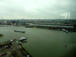 Boats in the IJ river and the city center with the Amsterdam Central Railway Station, viewed from the A`DAM Lookout Indoor observation deck at the A`DAM Tower