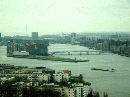 Boats in the IJ river, the Java Island and the Jan Schaeferbrug bridge, viewed from the A`DAM Lookout Indoor observation deck at the A`DAM Tower
