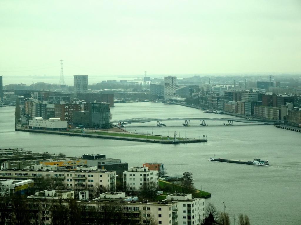 Boats in the IJ river, the Java Island and the Jan Schaeferbrug bridge, viewed from the A`DAM Lookout Indoor observation deck at the A`DAM Tower