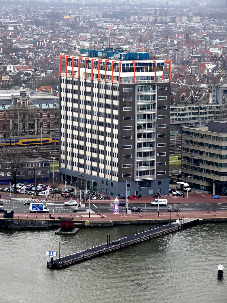 The IJ river and buildings at the De Ruijterkade street, viewed from the A`DAM Lookout Outdoor observation deck at the A`DAM Tower