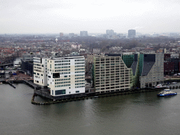 Boat in the IJ river and buildings at the IJdock area, viewed from the A`DAM Lookout Outdoor observation deck at the A`DAM Tower