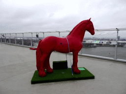 Red horse statue at the A`DAM Lookout Outdoor observation deck at the A`DAM Tower