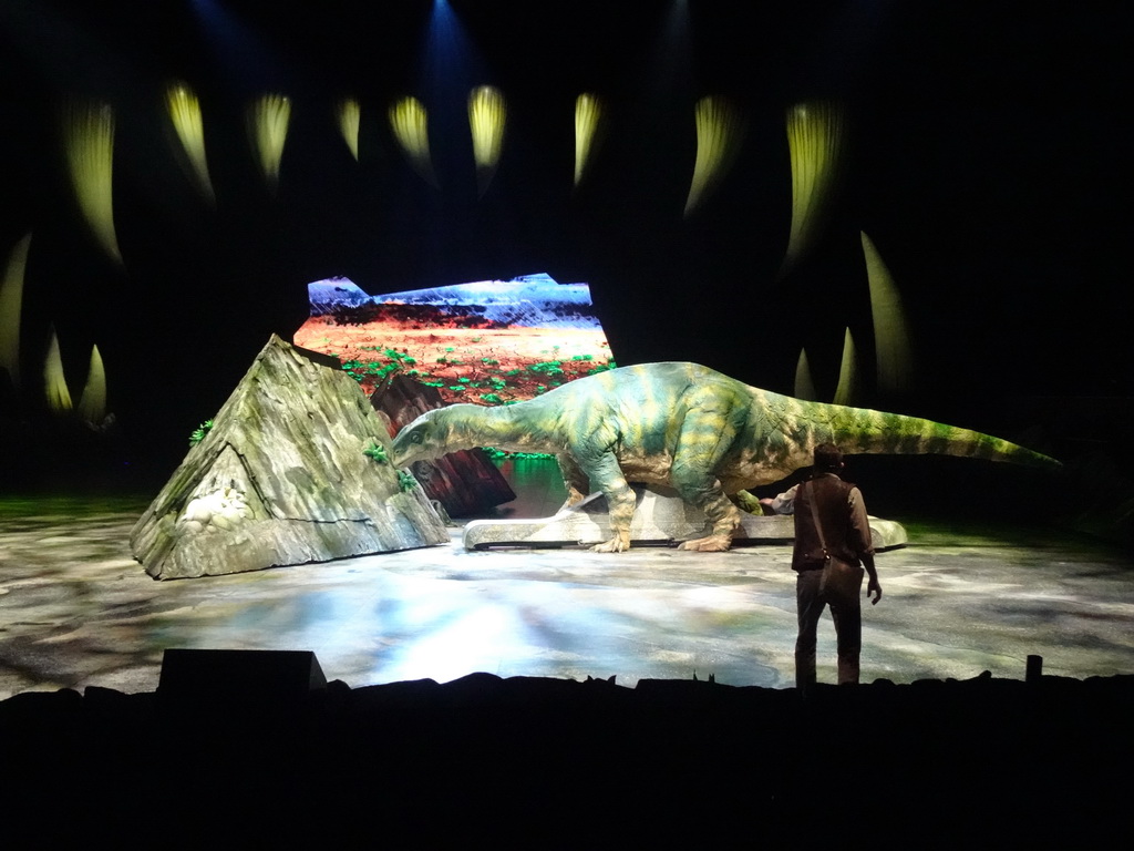 Plateosaurus statue and actor at the stage of the Ziggo Dome, during the `Walking With Dinosaurs - The Arena Spectacular` show