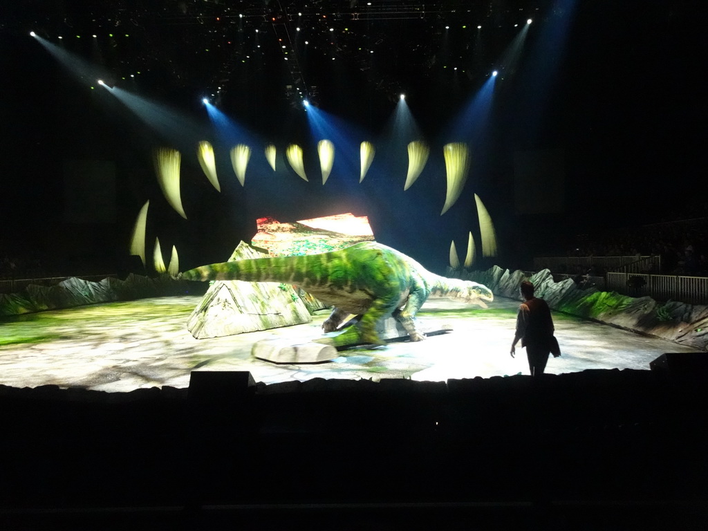 Plateosaurus statue and actor at the stage of the Ziggo Dome, during the `Walking With Dinosaurs - The Arena Spectacular` show