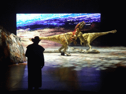 Utahraptor statues and actor at the stage of the Ziggo Dome, during the `Walking With Dinosaurs - The Arena Spectacular` show