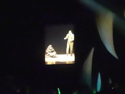 Projection on an actor with Torosaurus poop at the stage of the Ziggo Dome, during the `Walking With Dinosaurs - The Arena Spectacular` show