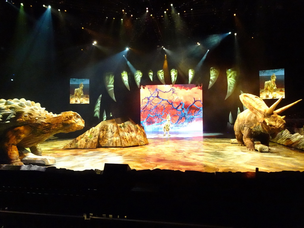 Ankylosaurus statue, young Tyrannosaurus Rex statue and Torosaurus statue at the stage of the Ziggo Dome, during the `Walking With Dinosaurs - The Arena Spectacular` show