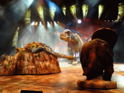 amsterdam_16_076 - 301 kb - 1024x768 - Ankylosaurus statue, Tyrannosaurus Rex statue and Torosaurus statue at the stage of the Ziggo Dome, during the `Walking With Dinosaurs - The Arena Spectacular` show Ankylosaurus statue, Tyrannosaurus Rex statue and Torosaurus statue at the stage of the Ziggo Dome, during the `Walking With Dinosaurs - The Arena Spectacular` show
