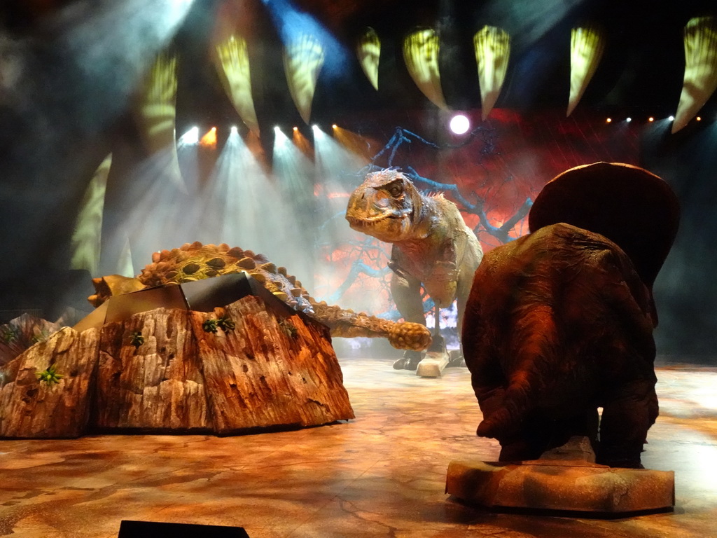 Ankylosaurus statue, Tyrannosaurus Rex statue and Torosaurus statue at the stage of the Ziggo Dome, during the `Walking With Dinosaurs - The Arena Spectacular` show