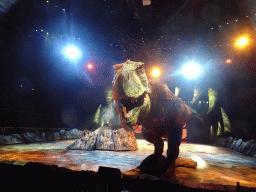 Tyrannosaurus Rex statue and actor at the stage of the Ziggo Dome, during the `Walking With Dinosaurs - The Arena Spectacular` show