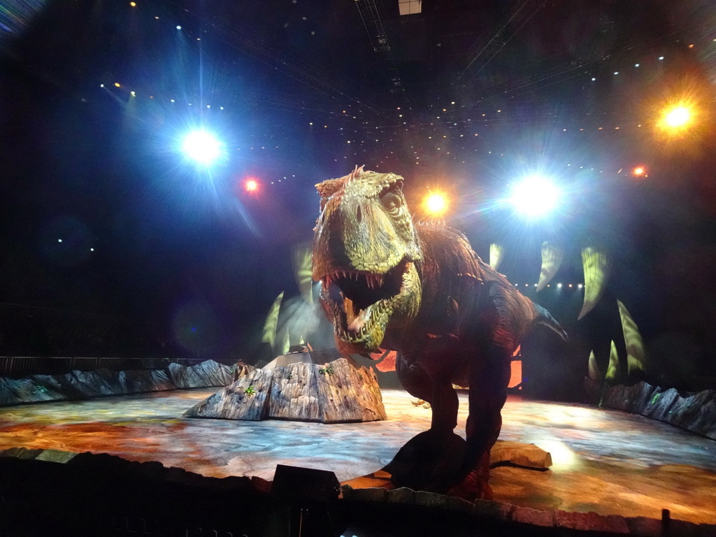 Tyrannosaurus Rex statue and actor at the stage of the Ziggo Dome, during the `Walking With Dinosaurs - The Arena Spectacular` show