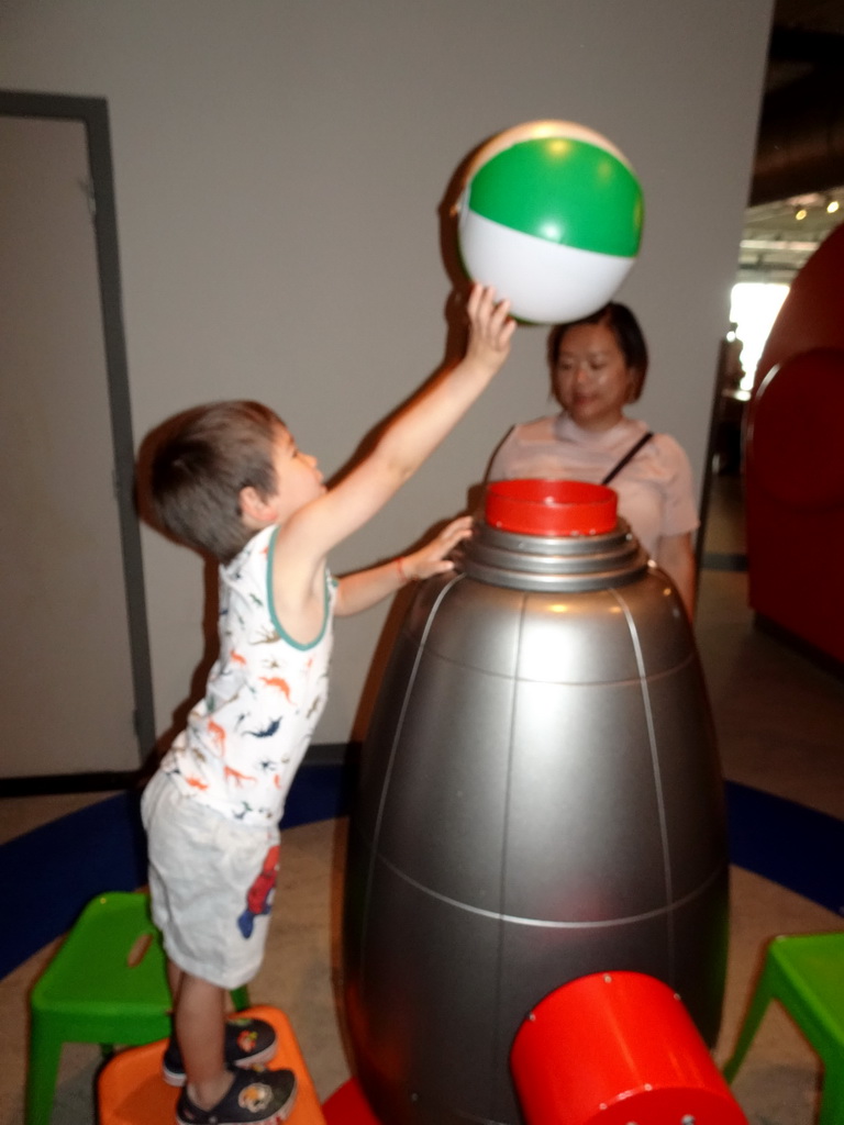 Miaomiao and Max with a wind blower at the Fenomena exhibition at the First Floor of the NEMO Science Museum