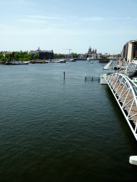 The Mr. J.J. van der Veldebrug bridge over the Oosterdok canal, the Grand Hotel Amrâth Amsterdam and the Oude Kerk church, viewed from the Third Floor of the NEMO Science Museum