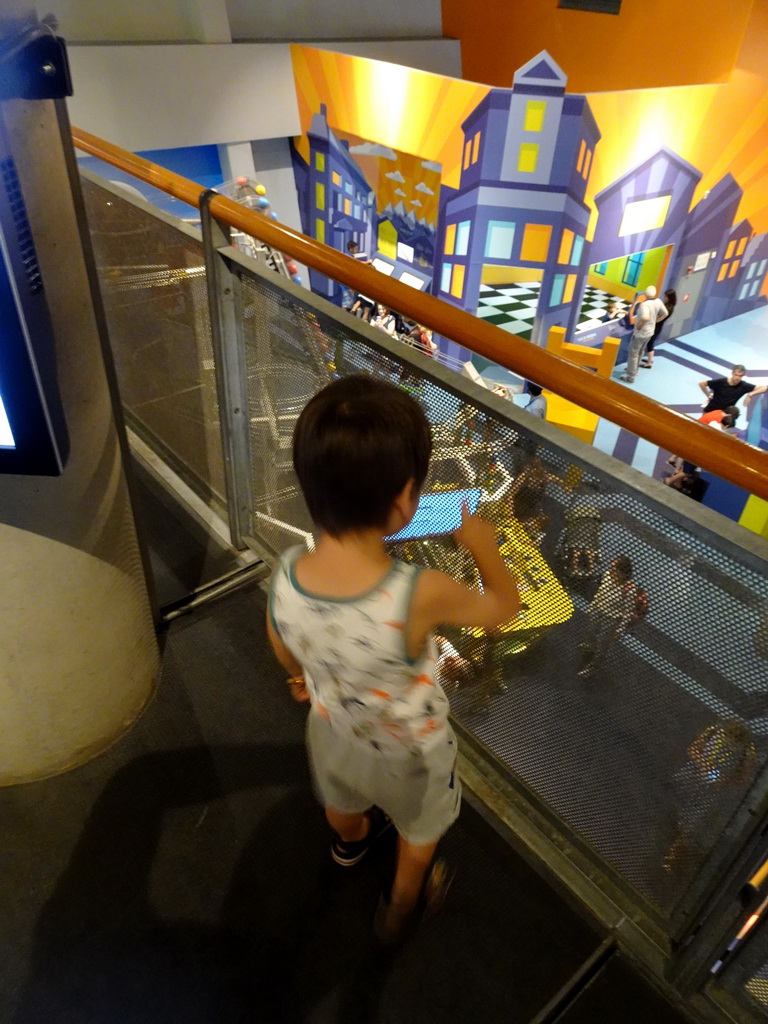 Max at the Third Floor of the NEMO Science Museum, with a view on the Second Floor
