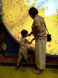 Miaomiao and Max at the World of Shapes game at the Technium exhibition at the Second Floor of the NEMO Science Museum