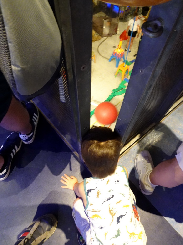 Max looking at the Chain Reaction demonstration at the Second Floor of the NEMO Science Museum