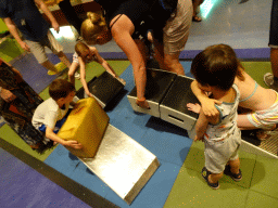 Max building a bridge at the Technium exhibition at the Second Floor of the NEMO Science Museum