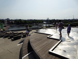 Miaomiao at the Energetica exhibition at the roof at the Fifth Floor of the NEMO Science Museum, with a view on the Oosterdok canal