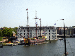 The Oosterdok canal and the National Maritime Museum with the replica of the `Amsterdam` ship, viewed from the roof at the Fifth Floor of the NEMO Science Museum