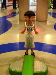 Max with a mirror at the Fenomena exhibition at the First Floor of the NEMO Science Museum