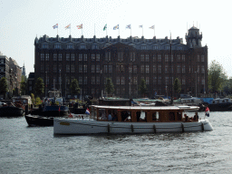Boats in the Oosterdok canal and the Grand Hotel Amrâth Amsterdam, viewed from the Sea Palace restaurant