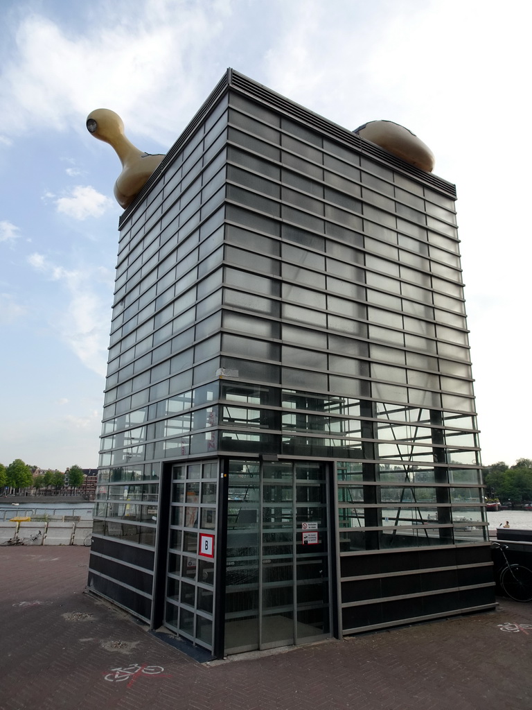 Entrance to the elevator of the Parking Garage Oosterdok at the Oosterdokskade street, with the Ode`s Blozers lights on top