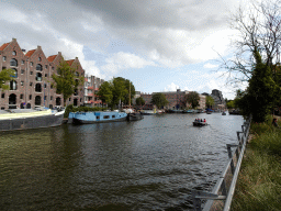 Houses and boats in the Entrepotdok canal, viewed from the Royal Artis Zoo
