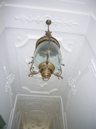 Lamp in the hallway of a building at the Keizersgracht street