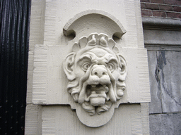 Relief at the facade of the Huis met de Hoofden museum at the Keizersgracht street