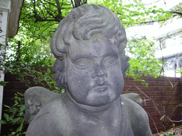 Statue at the garden of the Huis met de Kolommen building