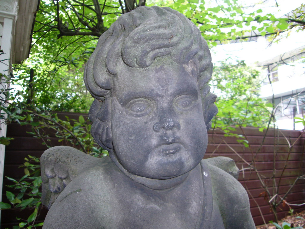 Statue at the garden of the Huis met de Kolommen building
