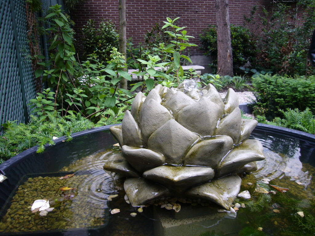 Fountain in the garden of the Tassenmuseum Hendrikje