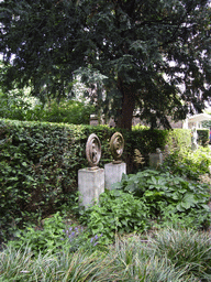 Statues at the garden of a building at the Herengracht street
