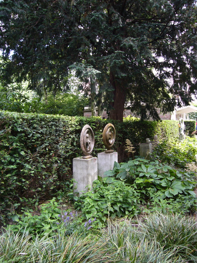 Statues at the garden of a building at the Herengracht street