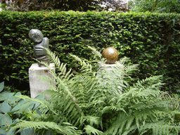 Statues at the garden of a building at the Herengracht street