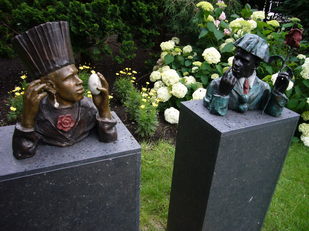 African statues at the garden of a building at the Herengracht street