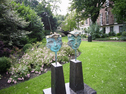 Busts at the garden of a building at the Herengracht street