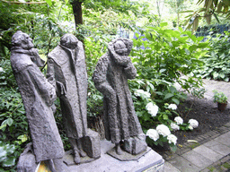 Statues in the garden of a building at the Herengracht street