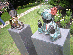 African statues at the garden of a building at the Herengracht street