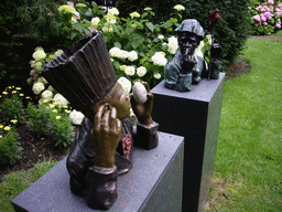 African statues at the garden of a building at the Herengracht street