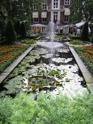 Pond with fountain at the garden of the Herengracht 518 building