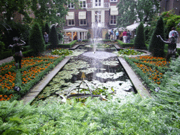 Pond with fountain at the garden of the Herengracht 518 building