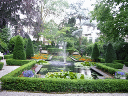 Pond with fountain at the garden of the Herengracht 518 building