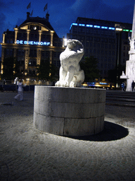 Lion statue at the Nationaal Monument at the Dam square, by night